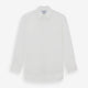 The Turnbull & Asser White Sea Island Quality Cotton Shirt features a T&A collar, double cuffs, and long sleeves, displayed against a white background.