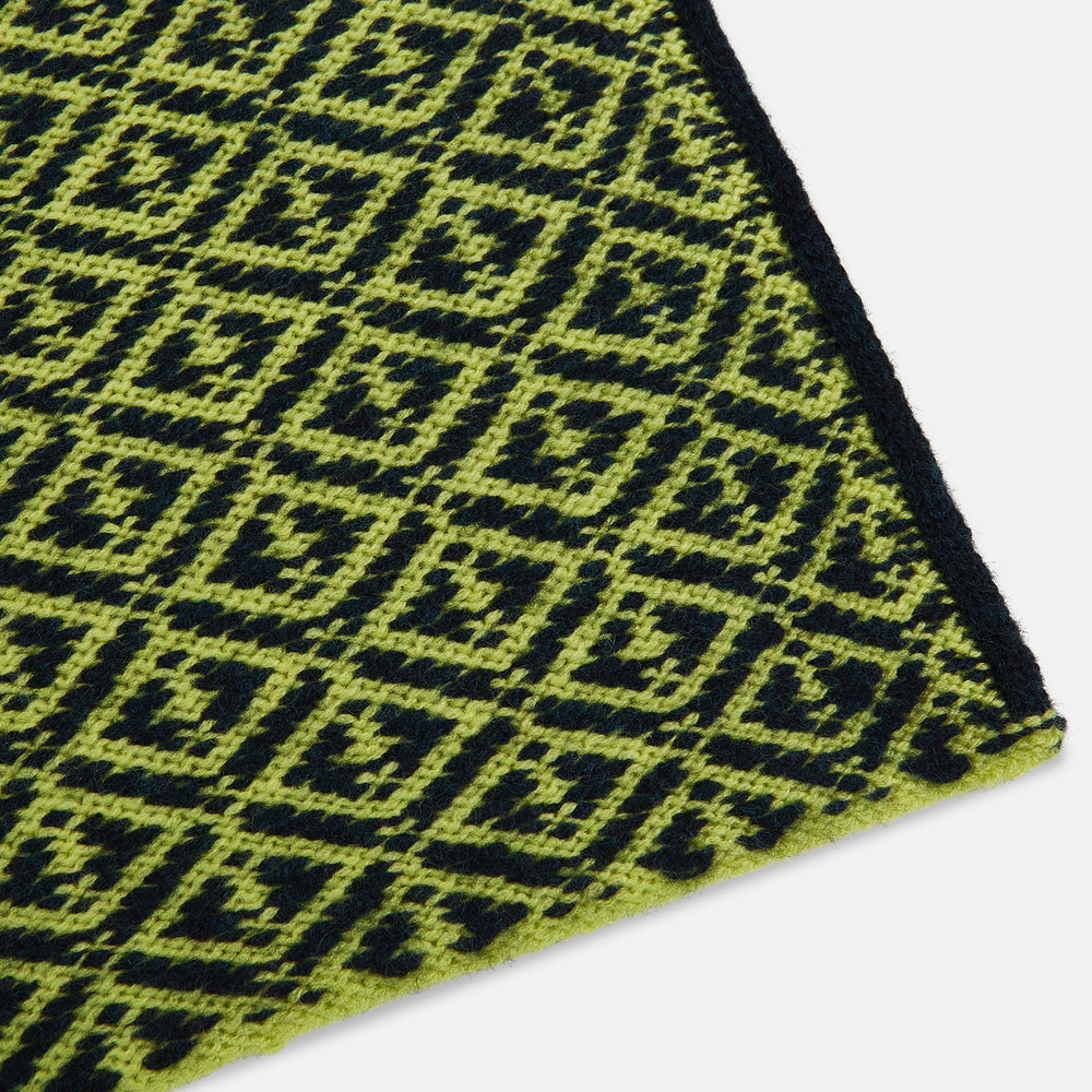 A Petrol Green and Chartreuse diamond-patterned cashmere knitted scarf by Turnbull & Asser—an essential accessory for adding striking geometric flair to any look.