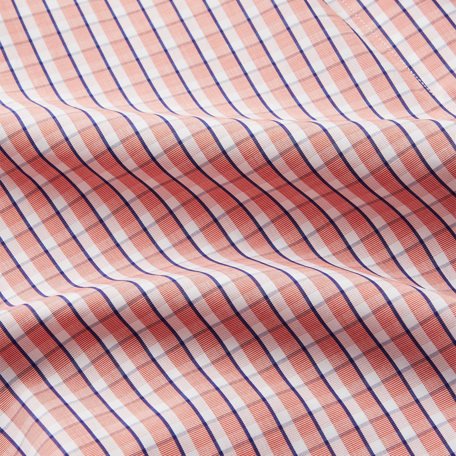 View 2 of product The Turnbull & Asser Orange Multi Check Cotton Arnold Gown features long sleeves, a shawl collar, wrap-around belt, and dark piping on the edges and pocket, displayed flat on a white background.