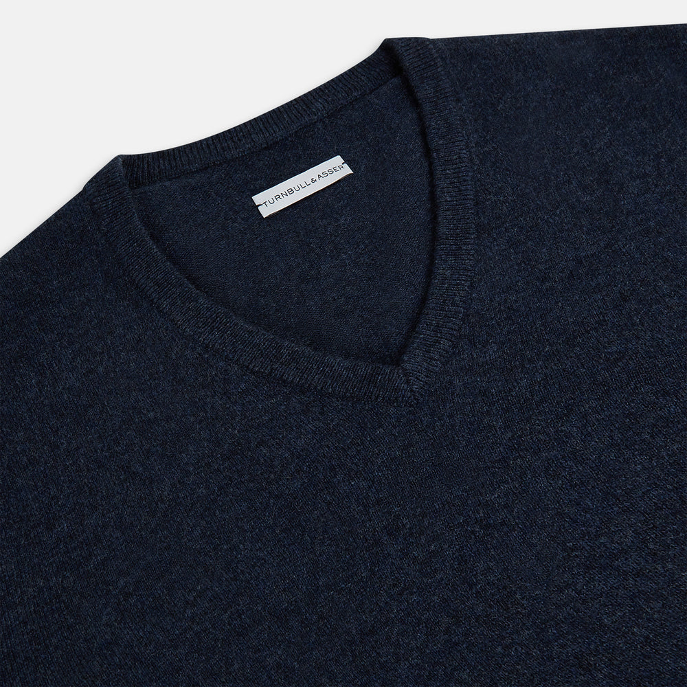 The Turnbull & Asser Navy Melange Cashmere V-Neck Jumper from our knitwear collection is shown against a white background.