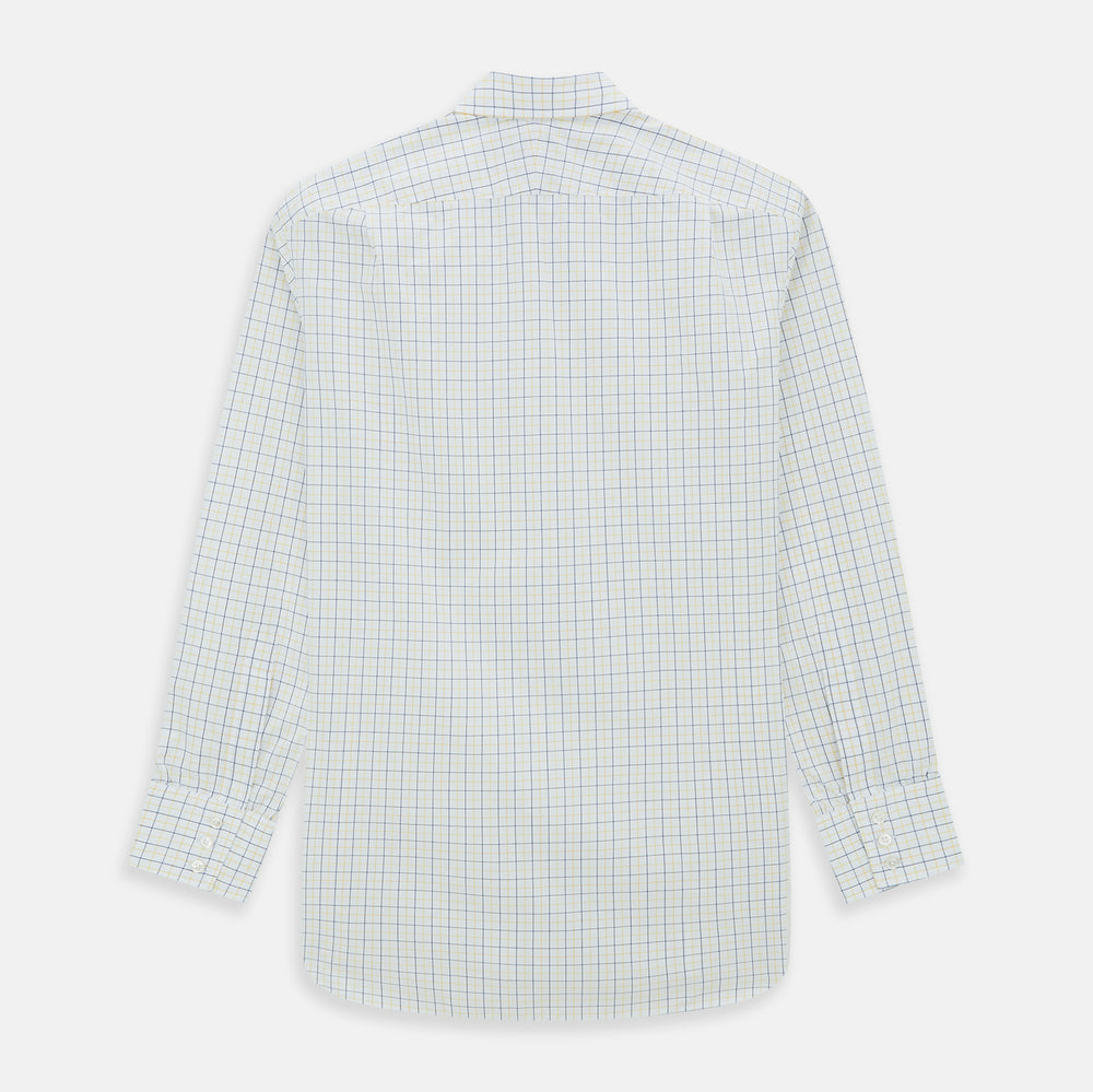 The Turnbull & Asser Yellow Overlay Grid Check Mayfair Shirt is a long-sleeve, button-down shirt made from soft organic cotton, featuring a yellow grid check pattern and shown laid flat on a white background.