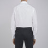 View 3 of product The Sea Island Cotton Classic Fit White Shirt by Turnbull & Asser features a classic collar and front buttons, neatly folded with its label visible, displayed on a light blue background.