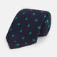 The Green flower and navy silk tie by Turnbull & Asser is perfect for adding a touch of color to any classic wardrobe.