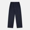 View 1 of product Turnbull & Asser’s Blue Multi Check Wool Hasting Pyjama Trousers, featuring an elastic waistband, are laid flat on a white background.