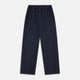 Turnbull & Asser’s Blue Multi Check Wool Hasting Pyjama Trousers, featuring an elastic waistband, are laid flat on a white background.
