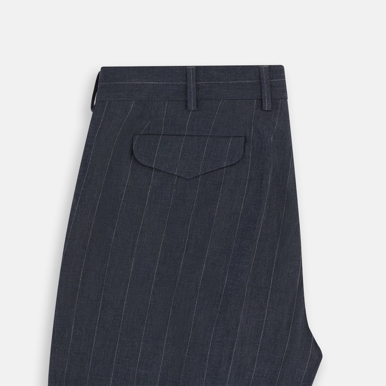 View 6 of product The Navy Striped Edmund trousers by Turnbull & Asser have a relaxed, straight-leg fit with front pleats, belt loops, and a single button waist closure, shown against a plain white background.