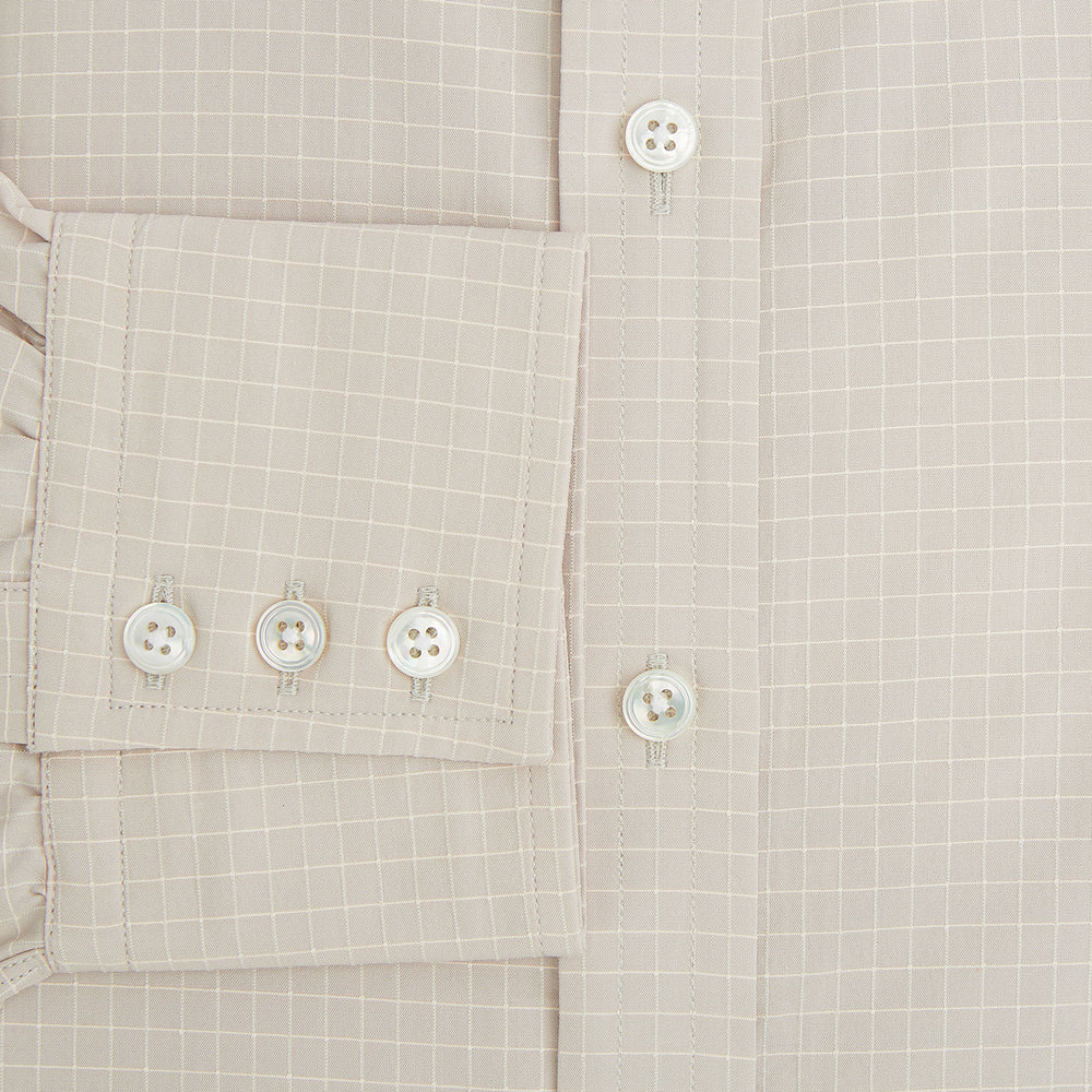 The Turnbull & Asser Pale Pink Fine Check Mayfair Shirt features long sleeves, a collared neckline, buttoned cuffs, and a subtle check pattern in sanforised cotton, displayed against a white background.