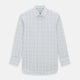 The Turnbull & Asser Multicoloured Double Grid Check Mayfair Shirt, made from organic cotton, features long sleeves, a collar, and a blue, green, and red grid check on white. The shirt is shown neatly laid flat against a white background.