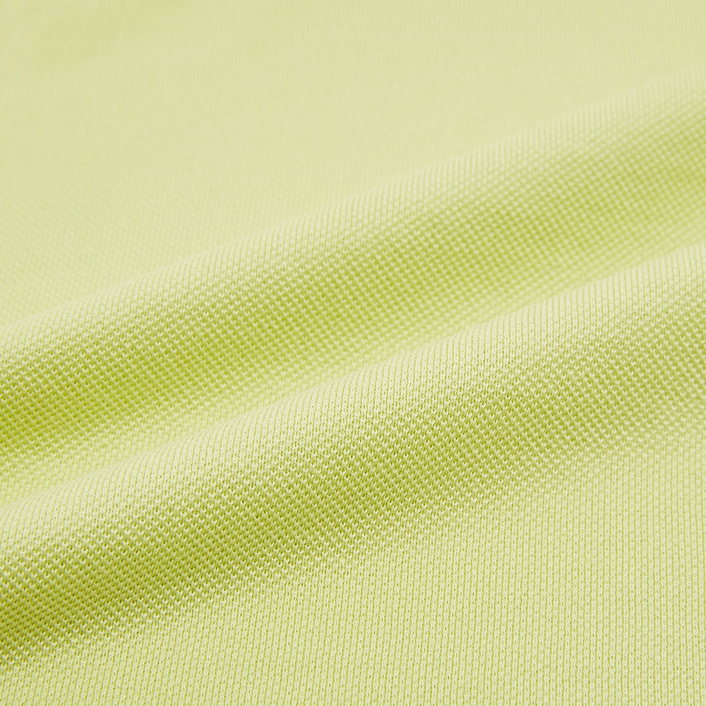 The Turnbull & Asser Lime Green Rugby Polo Shirt is a pure cotton, long-sleeve shirt with a collar and no visible buttons, displayed flat against a white background.