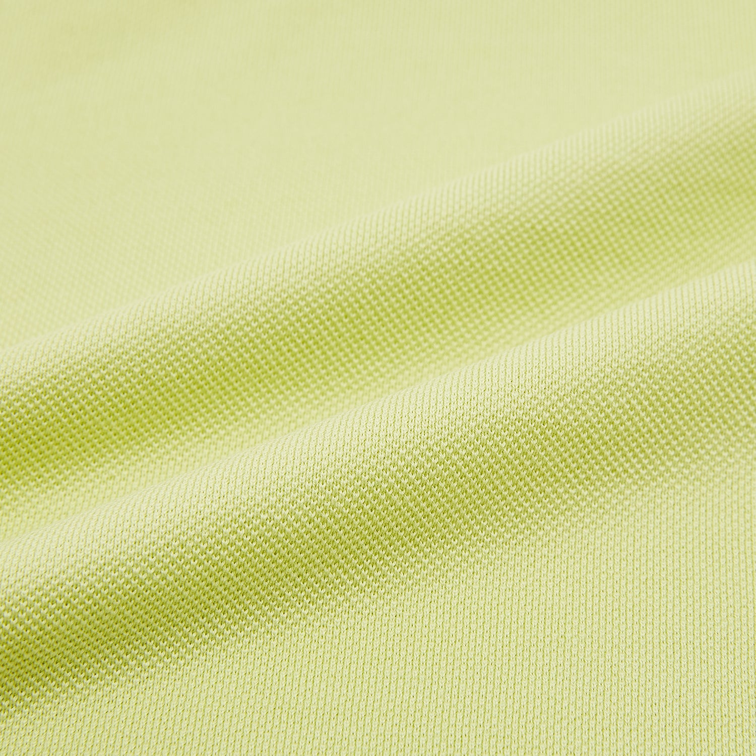 View 6 of product The Turnbull & Asser Lime Green Rugby Polo Shirt is a pure cotton, long-sleeve shirt with a collar and no visible buttons, displayed flat against a white background.