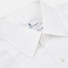 View 2 of product A neatly folded Die Another Day Inspired Voile Dress Shirt by Turnbull & Asser, featuring a classic collar and buttoned front, is displayed on a white background, evoking the timeless style of a James Bond shirt.