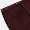 View 2 of product The Turnbull & Asser Burgundy Corduroy Henry Trousers feature a straight-leg cut, button and zip closure, and adjustable side tabs—perfect for refined formalwear—shown here on a plain white background.