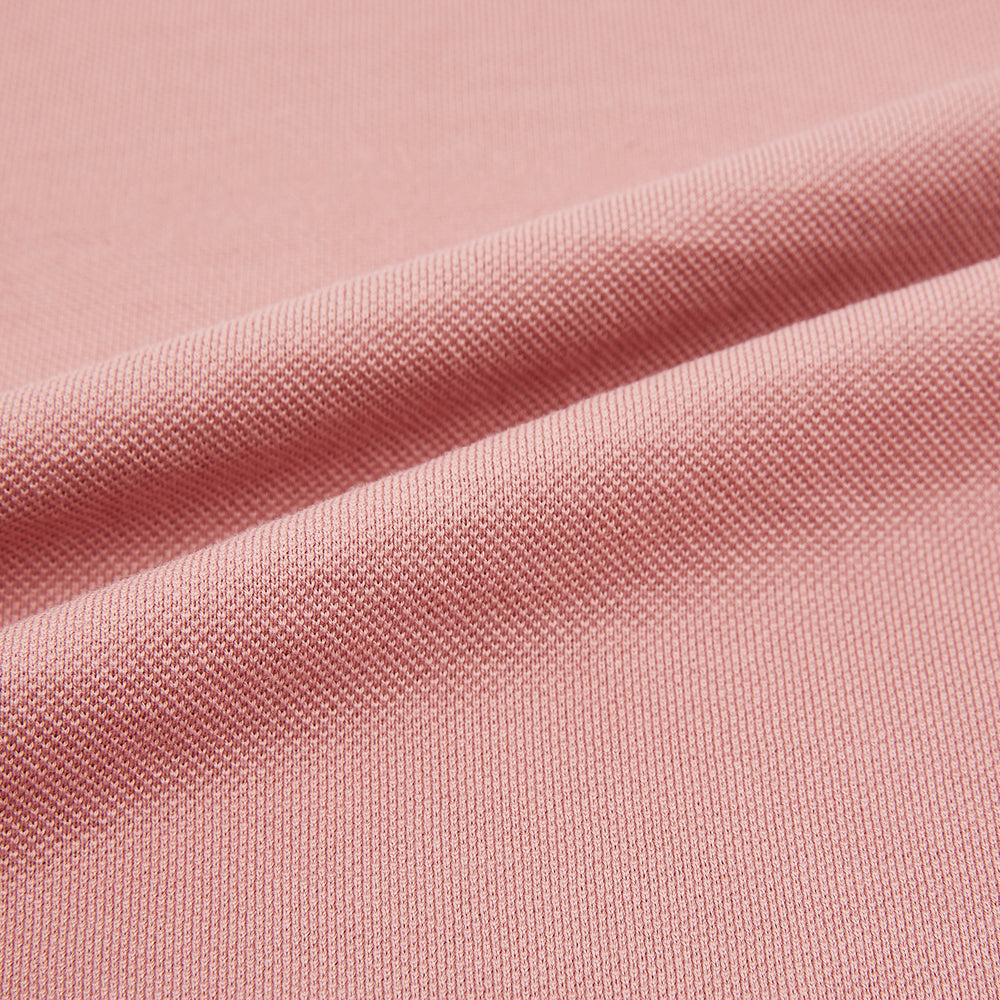 The Turnbull & Asser Red Polo Shirt is a men's cotton polo with short sleeves, a collar, a three-button neckline, and a buttoned chest pocket. The shirt is shown laid flat on a white background.