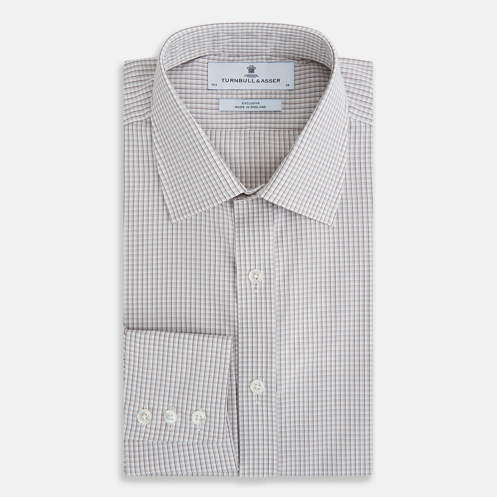 The Turnbull & Asser Grey Micro Shadow Check Mayfair Shirt is crafted from premium Italian cotton with long sleeves, a collar, and buttoned cuffs, shown folded flat against a white background.