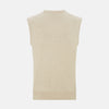View 3 of product The Turnbull & Asser Cream Cashmere V-neck Vest features a sleeveless design and ribbed hem, presented on a plain white background—a refined update to the classic men’s sweater.