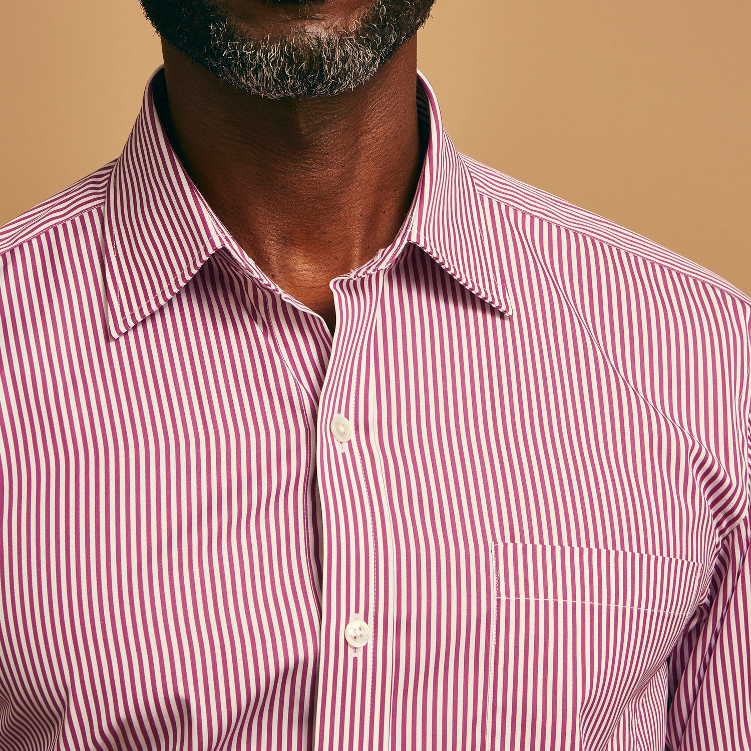 View 4 of product The Turnbull & Asser Purple & White Stripe Weekend Fit Shirt features a Derby collar, chest pocket, and 1-button cuffs—ideal for casual weekends.