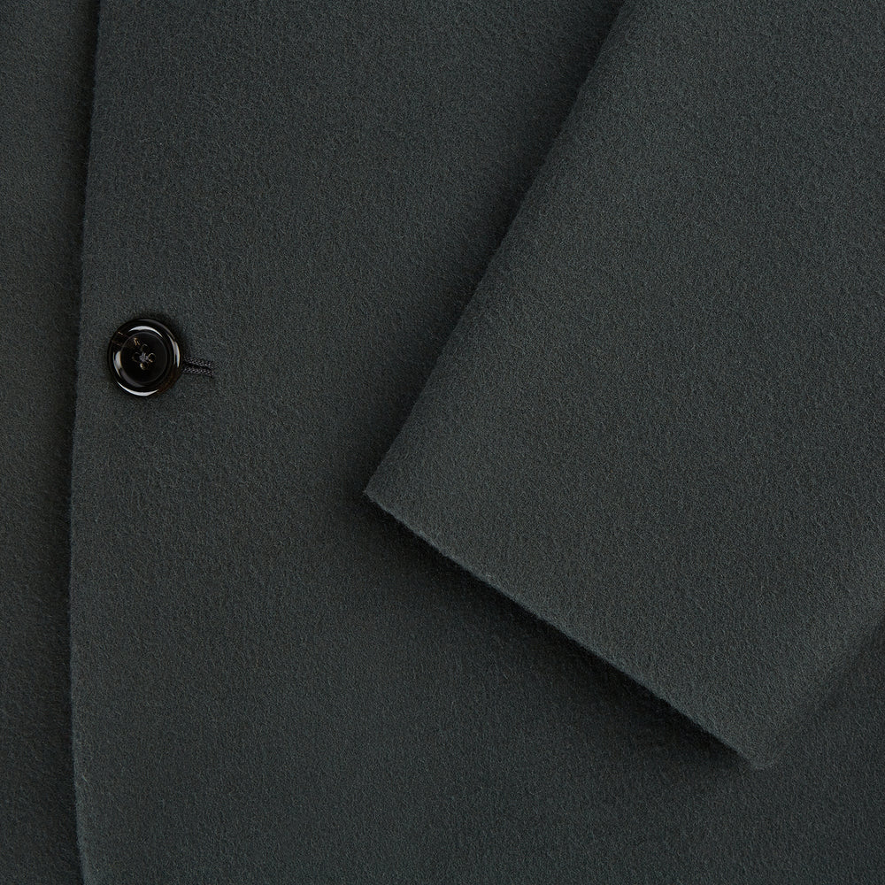 The Turnbull & Asser Moss Green Apsley Single-Breasted Caban Coat, featuring three buttons, a notched lapel, and three front pockets, is showcased on a plain white background.