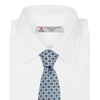 View 2 of product The Great Gatsby Silk Tie by Turnbull & Asser, as seen on Jay Gatsby—a light blue silk tie with red, yellow, and navy geometric floral motifs, ideal for classic 1920s-inspired shirts.