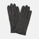 The Berkeley Black Leather Evening Gloves by Turnbull & Asser, one laid flat and the other resting partially on top, are displayed on a white background.