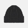 View 1 of product The Turnbull & Asser Charcoal Cable Knit Cashmere Hat features a ribbed fold-over cuff and textured pattern, ideal for winter, shown laid flat on a white background.