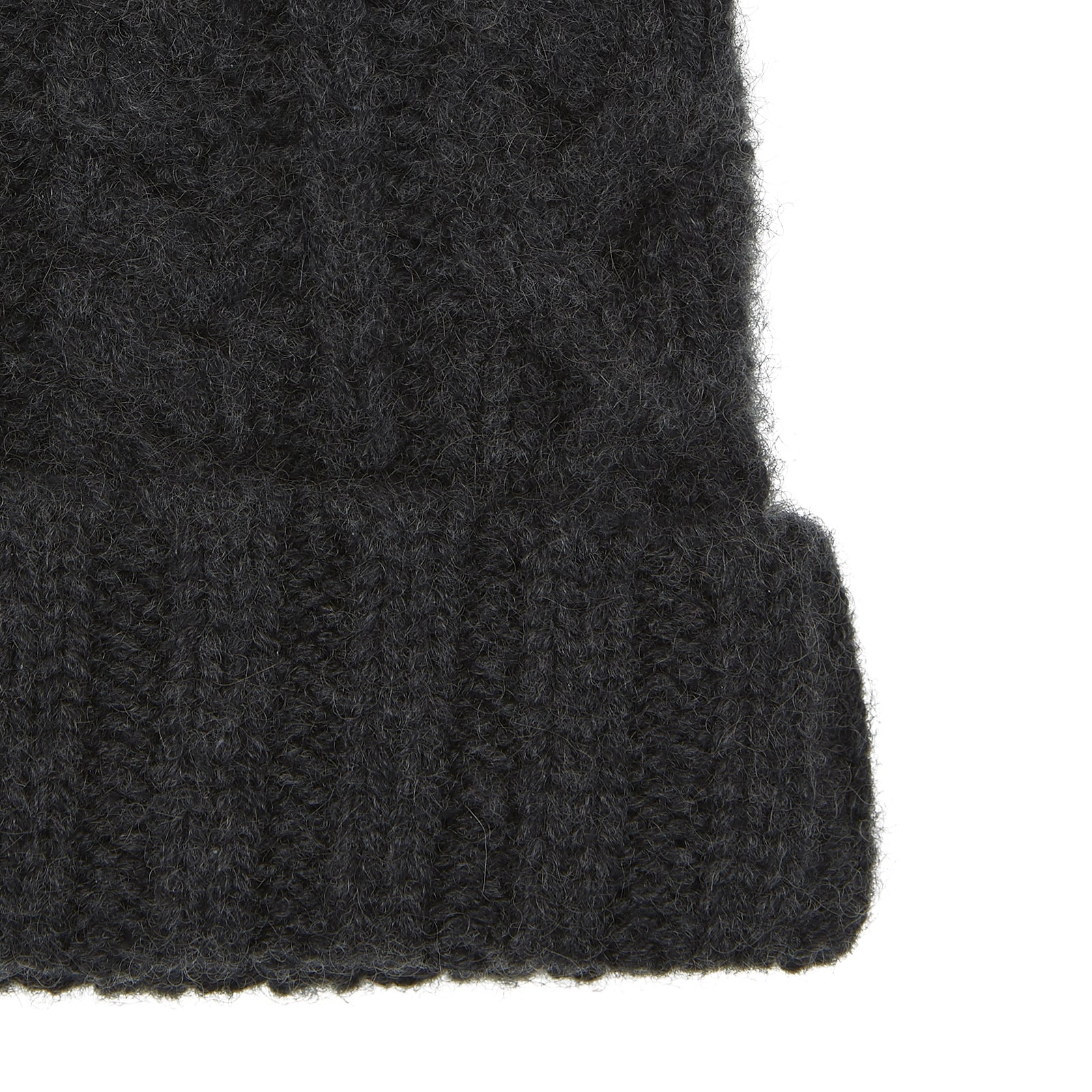 View 3 of product The Turnbull & Asser Charcoal Cable Knit Cashmere Hat features a ribbed fold-over cuff and textured pattern, ideal for winter, shown laid flat on a white background.