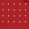 View 3 of product The Red and White Spot Silk Pocket Square by Turnbull & Asser features evenly spaced white polka dots on red silk with the brand's name printed in one corner. A folded edge reveals the reverse of this timeless pocket square.
