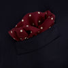 View 4 of product Add a touch of elegance with the Turnbull & Asser Burgundy Spot Silk Pocket Square, featuring white dots, a printed corner logo, and folded edging—a classic men’s accessory for any occasion.