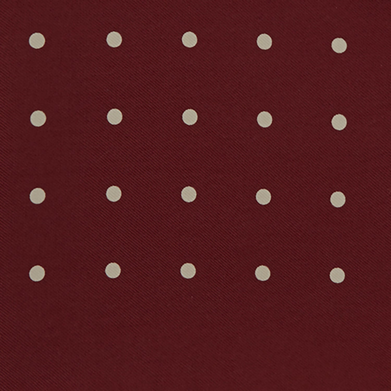View 3 of product Add a touch of elegance with the Turnbull & Asser Burgundy Spot Silk Pocket Square, featuring white dots, a printed corner logo, and folded edging—a classic men’s accessory for any occasion.