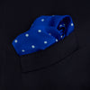 View 2 of product The Bright Blue Spot Silk Pocket Square by Turnbull & Asser features evenly spaced white polka dots and the brand's name printed in white in the bottom right corner, making it a stylish accessory for any suit.