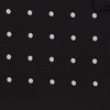 View 3 of product The Black Spot Silk Pocket Square by Turnbull & Asser features classic white polka dots on black silk, with the brand name printed in one corner and a stylish folded design.