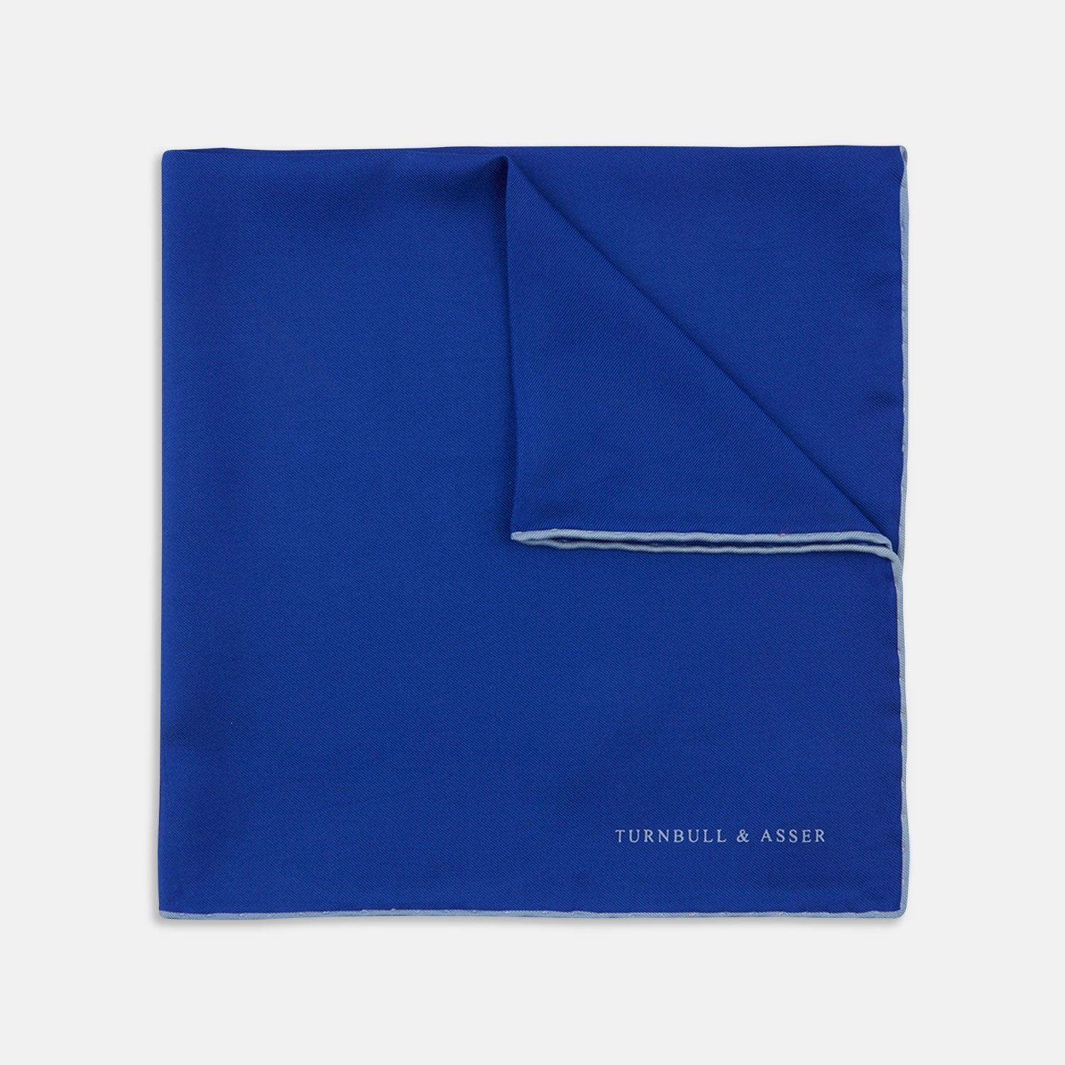 View 1 of product A Dark Blue Piped Silk Pocket Square by Turnbull & Asser, neatly folded with white edging and the brand's logo in one corner, displayed on a plain white background.