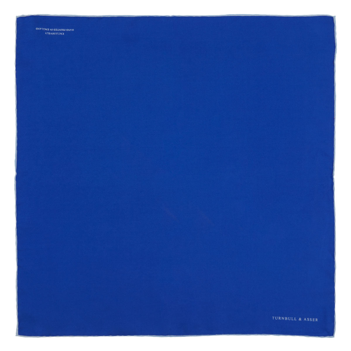 View 2 of product A Dark Blue Piped Silk Pocket Square by Turnbull & Asser, neatly folded with white edging and the brand's logo in one corner, displayed on a plain white background.