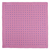 View 2 of product The Turnbull & Asser Rose and Blue Spot Silk Pocket Square features a pastel pink base with evenly spaced blue spots and a discreet white logo in one corner, finished with a slightly folded top for added flair.