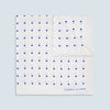 View 1 of product The Turnbull & Asser White and Blue Spot Silk Pocket Square features evenly spaced blue dots, a brand logo in one corner, and is displayed on a light blue background with a stylishly folded corner.