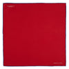 View 2 of product The Red and Navy Piped Silk Pocket Square by Turnbull & Asser features classic red silk with navy edging and the brand’s name printed in white on the bottom right corner.