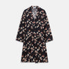 View 1 of product The Turnbull & Asser Navy Floral Pattern Linen Hayhurt Kimono Gown is a knee-length, long-sleeved gown with a floral print and a matching fabric belt tied at the waist.