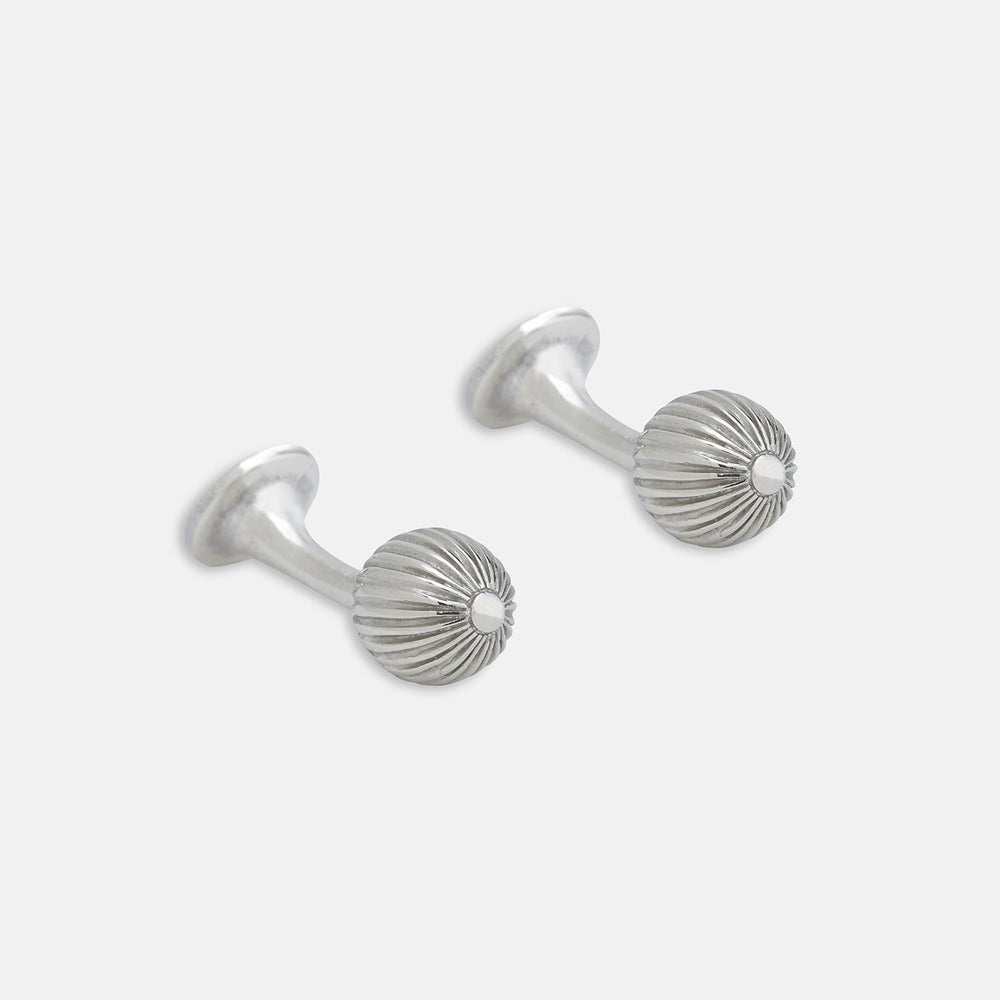 Turnbull & Asser's Sterling Silver Ornament Cufflinks feature round, textured ridged ends and smooth, flat backs, presented elegantly on a plain white background.