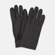 Turnbull & Asser Black Kirkdale Leather Gloves, featuring textured black leather and a sleek wrist strap with a small buckle detail, are displayed on a white background.