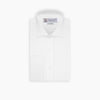 View 3 of product A neatly folded Turnbull & Asser Tailored Fit White Marcella Front Shirt with a Kent collar and double cuffs is displayed against a light grey background, with the label inside the collar visible.