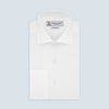 View 1 of product The Tailored Fit White Pleated Front Shirt with Kent Collar and Double Cuffs by Turnbull & Asser is neatly folded and buttoned up, shown on a light grey background—a classic black tie shirt option.