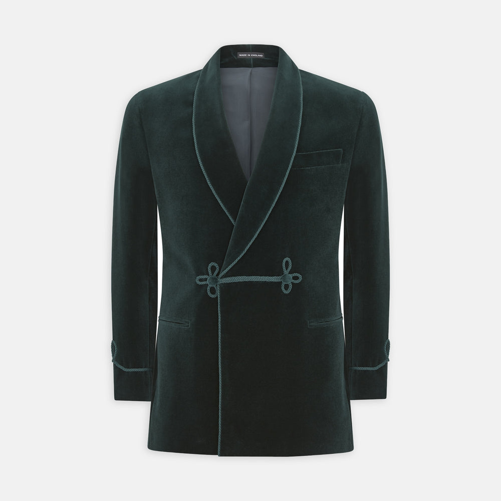 The Turnbull & Asser Green Double Breasted Velvet Smoking Jacket features a shawl collar, frog closures, and trim detailing on the cuffs and edges, shown against a white background—a sophisticated piece of eveningwear.