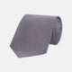 The Plum Houndstooth Silk Tie by Turnbull & Asser features a refined small black, white, and gray pattern—perfect as an office shirt accessory—shown rolled up on a plain white background.