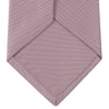 View 4 of product The Turnbull & Asser Rose Horizontal Twill Silk Tie features a pale pink ribbed silk texture, displayed on a white background—ideal for adding a smart touch to cotton shirts.