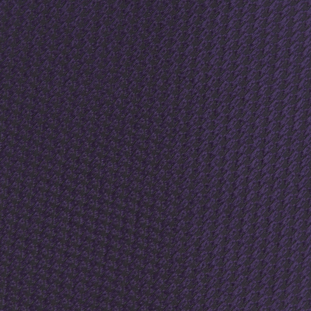 The Turnbull & Asser Plum Lace Silk Tie features a neatly rolled, dark purple design with a textured finish, displayed on a plain white background.