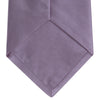 View 4 of product The Turnbull & Asser Lilac Plain Satin Silk Tie, featuring a smooth finish, is neatly rolled and displayed on a white background—a classic accessory for any versatile wardrobe.