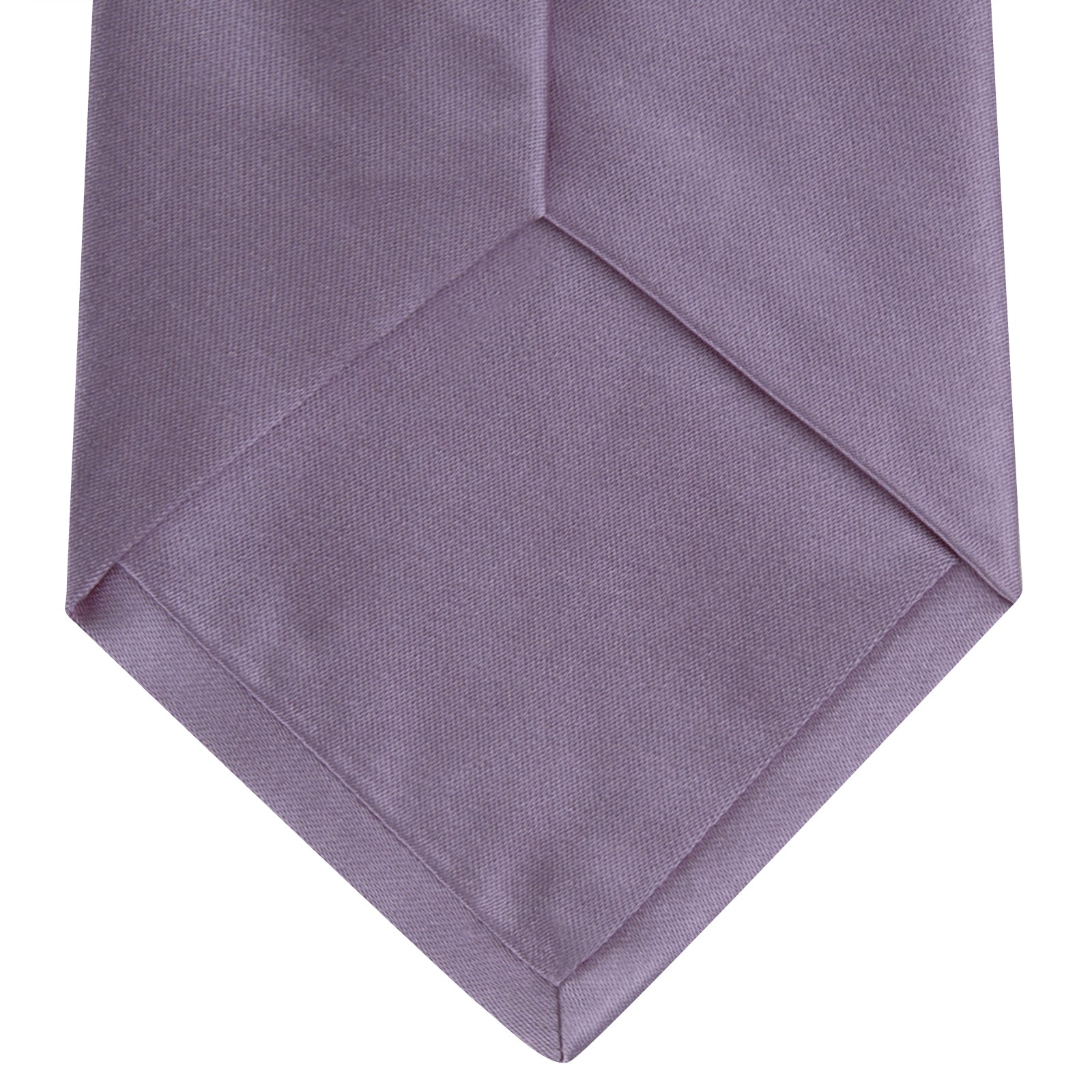 View 4 of product The Turnbull & Asser Lilac Plain Satin Silk Tie, featuring a smooth finish, is neatly rolled and displayed on a white background—a classic accessory for any versatile wardrobe.
