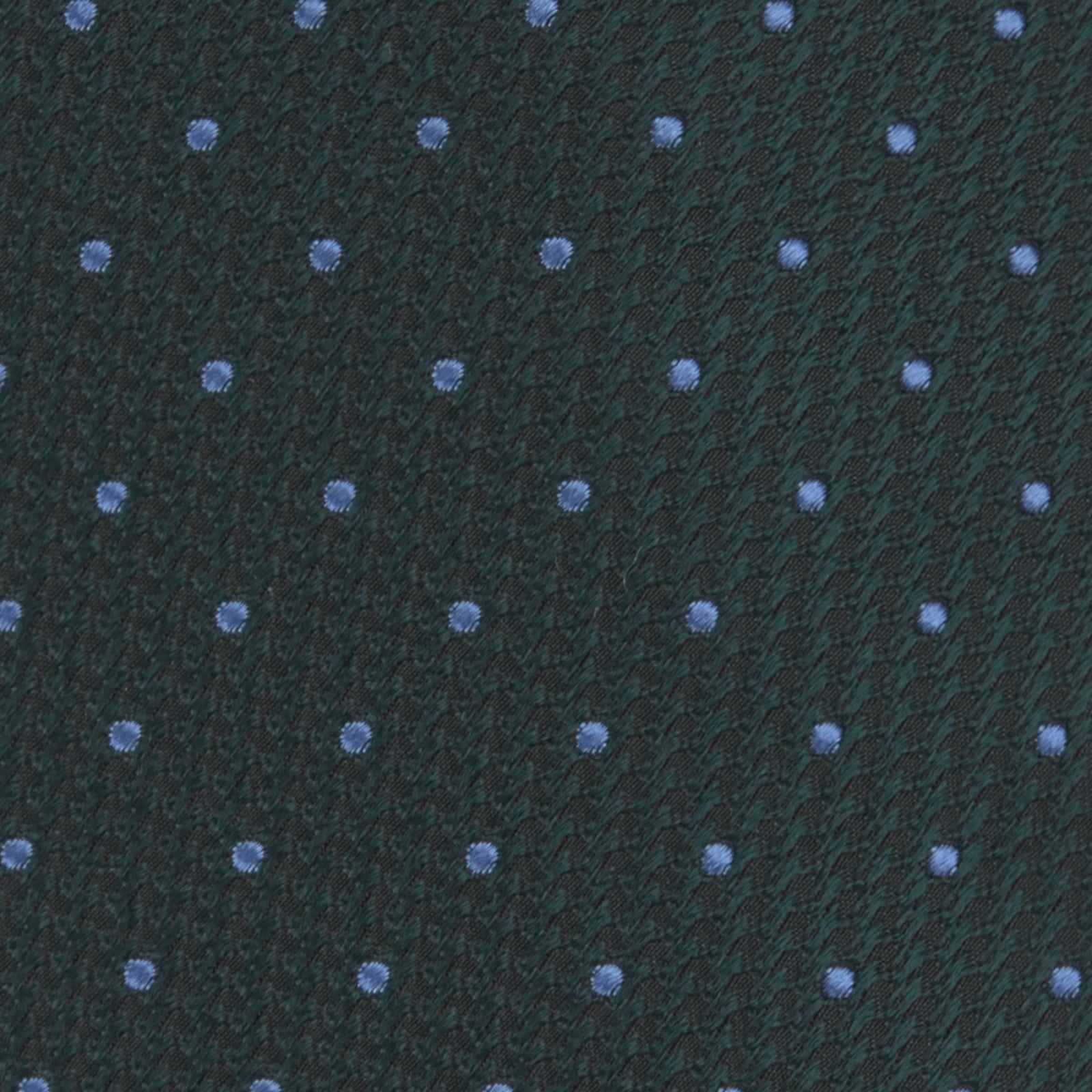 View 3 of product The Turnbull & Asser Forest Green and Blue Spot Lace Silk Tie features small blue dots on green silk—an elegant accessory to complement your favorite office shirt.