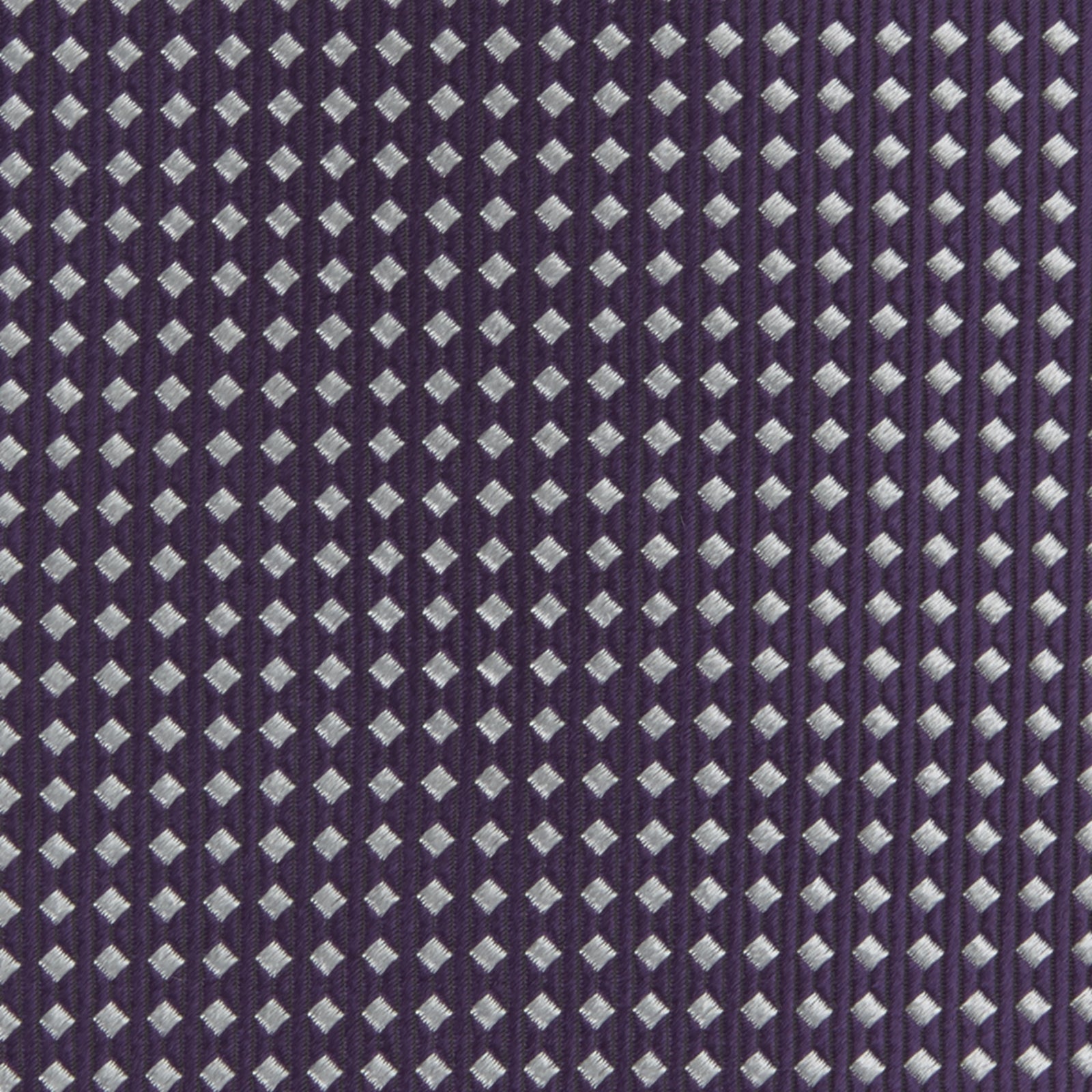 View 3 of product The Turnbull & Asser Plum and White Diamond Silk Tie features a subtle repeating pattern, shown rolled up on a white background—a timeless accessory to elevate any office shirt.