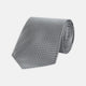 The Turnbull & Asser Grey and White Diamond Silk Tie, featuring a subtle textured pattern, is perfect for pairing with an office shirt and is displayed against a white background.