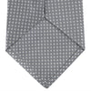 View 4 of product The Turnbull & Asser Grey and White Diamond Silk Tie, featuring a subtle textured pattern, is perfect for pairing with an office shirt and is displayed against a white background.